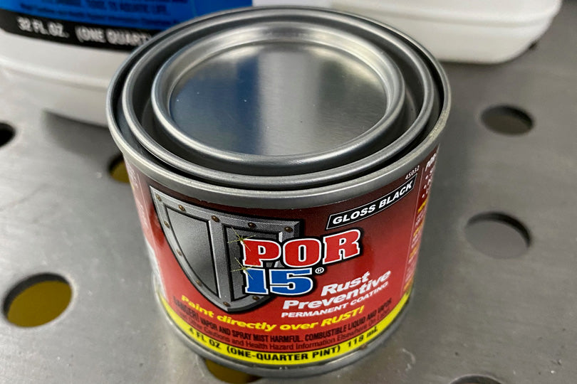 Can of POR-15 Rust Protective Treatment.