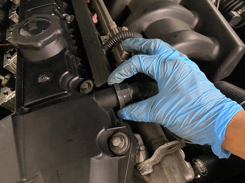 How to remove the positive crankcase ventilation hose.