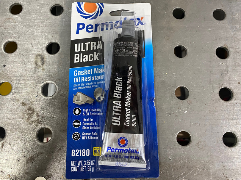 Tube of Permatex Ultra Black in the original packaging.
