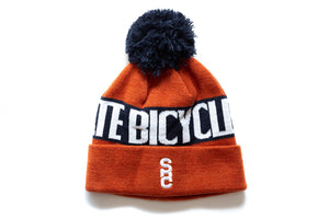 state-bicycle-co-beanie-with-pom-burnt-orange-navy