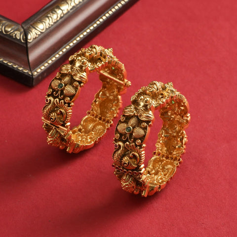 An image of a pair of antique style bangles
