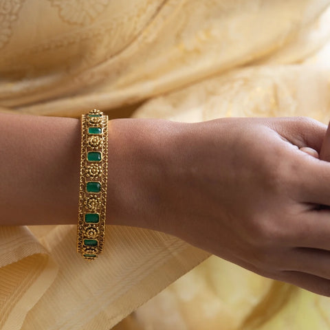 An image of a woman wearing Indian bangles.