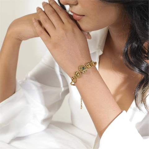 An image of a woman wearing a bracelet chain
