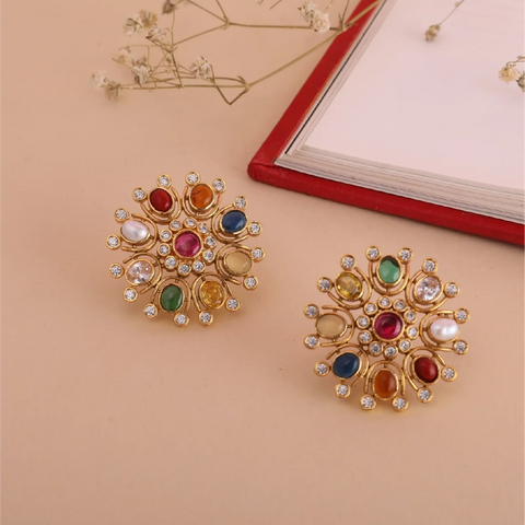 An image of a stud earrings, crafted with gemstones