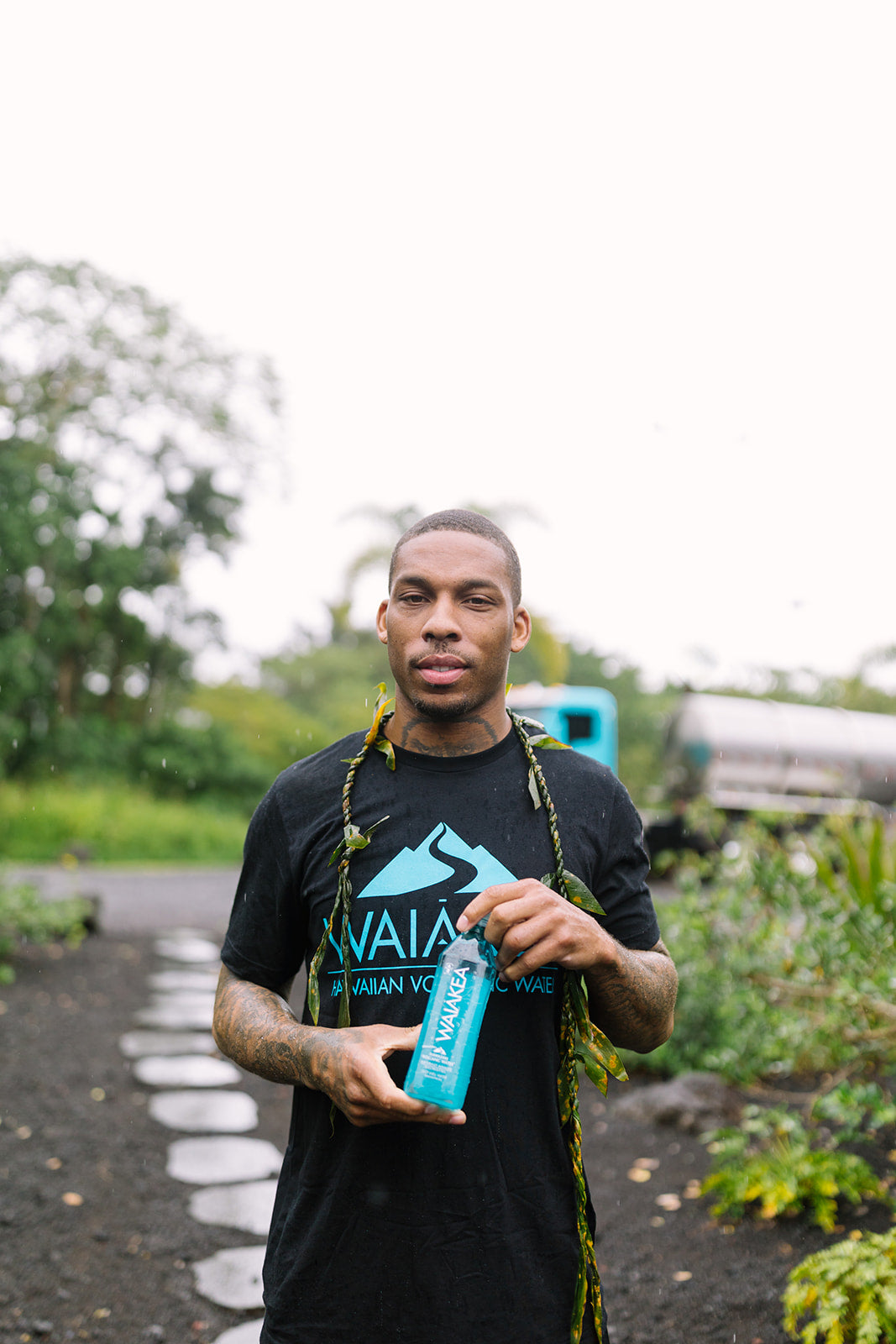 Troy Hill holding waiakea water 