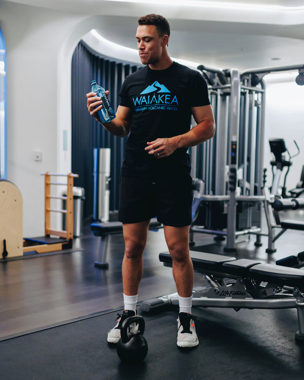 Aaron Judge stares at his Waiakea Water