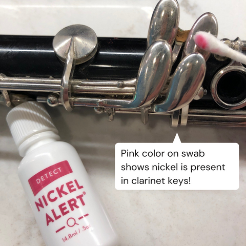 Image of clarinet keys that have been tested with Nickel Alert and positive for nickel.