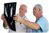 Image of two doctors reviewing an x-ray.  Inform all health care providers if you have a nickel allergy