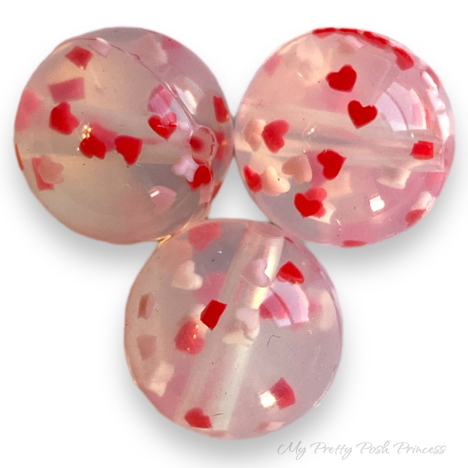 T238- 15mm “Heart Confetti" Silicone Beads