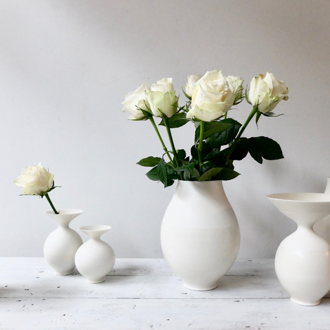 White Roses and Porcelain Vases