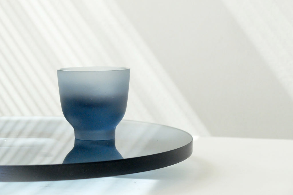 dark blue glass cup