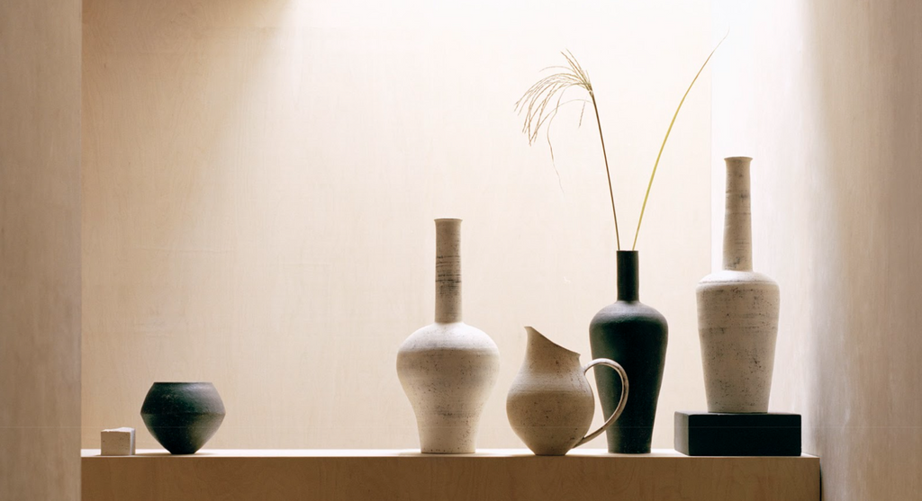 Lined cream and black vessels 