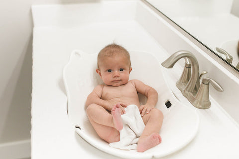 baby in sink using puj flyte 