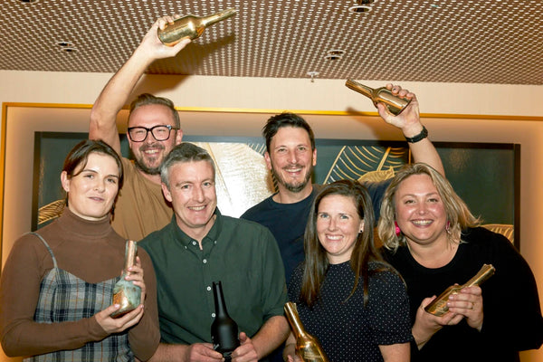 Young Gun of Wine award winners holding up trophies