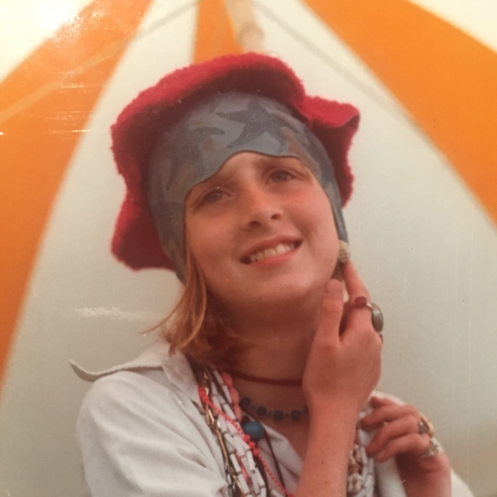 Frankie aged about 10 wearing eccentric outfit with swimming cap