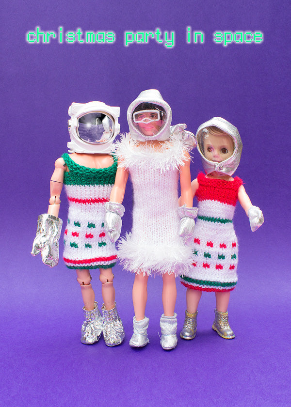 Christmas party in space - astronauts wearing woolly dresses
