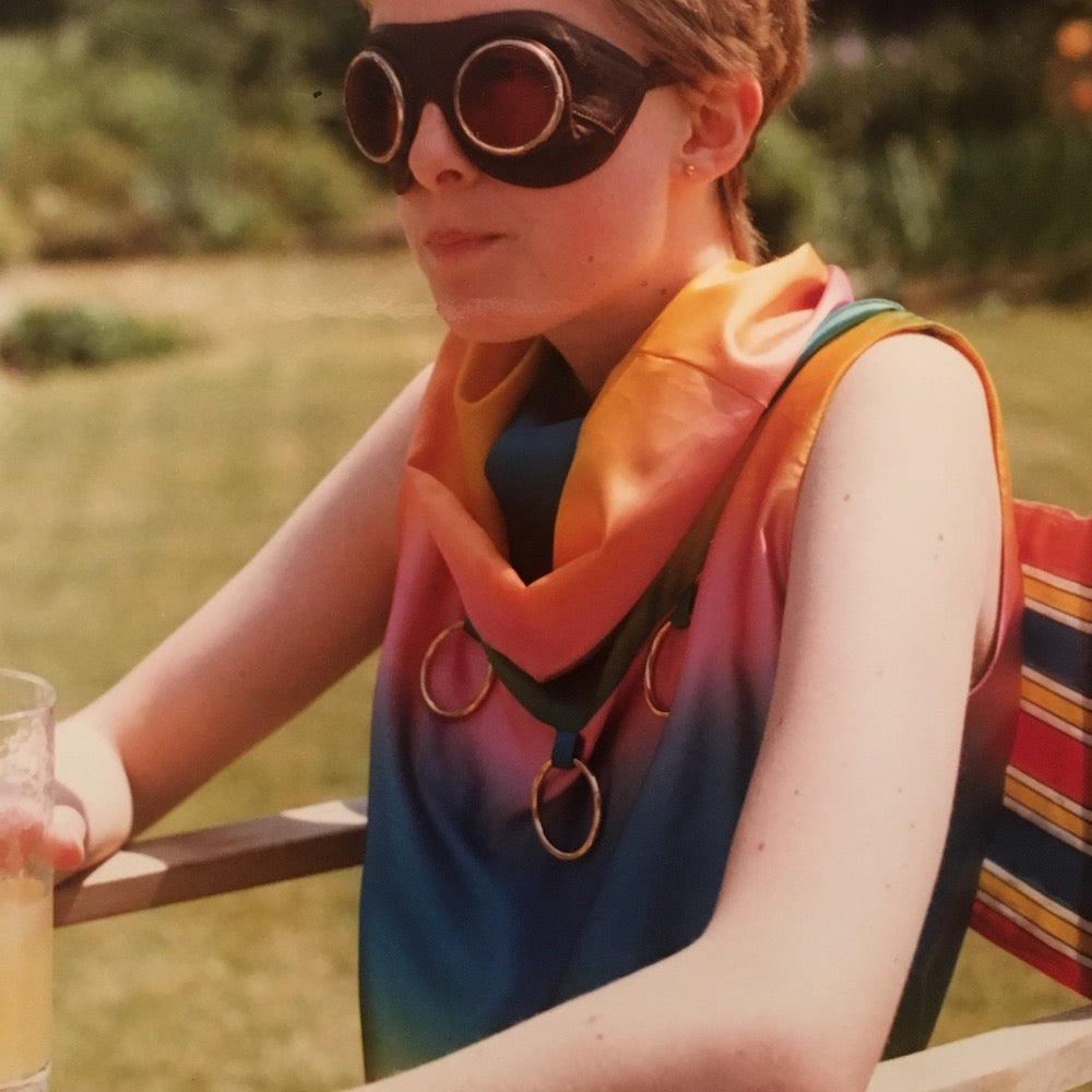 Frankie Sinclair age 14 into Aviator glasses.