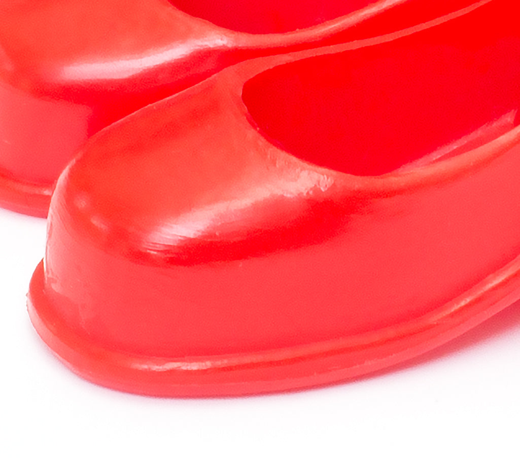 Close up of Sindy red court shoes