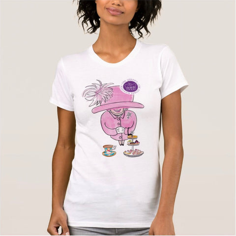 Female model wearing crew neck T-shirt with cartoon of the Queen in pink outfit. Cream tea in the foreground