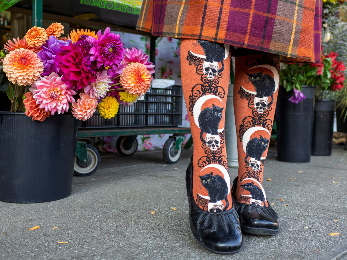 Black Cat Moon Knee Socks in Heather Sienna worn with plaid skirt and black shoes