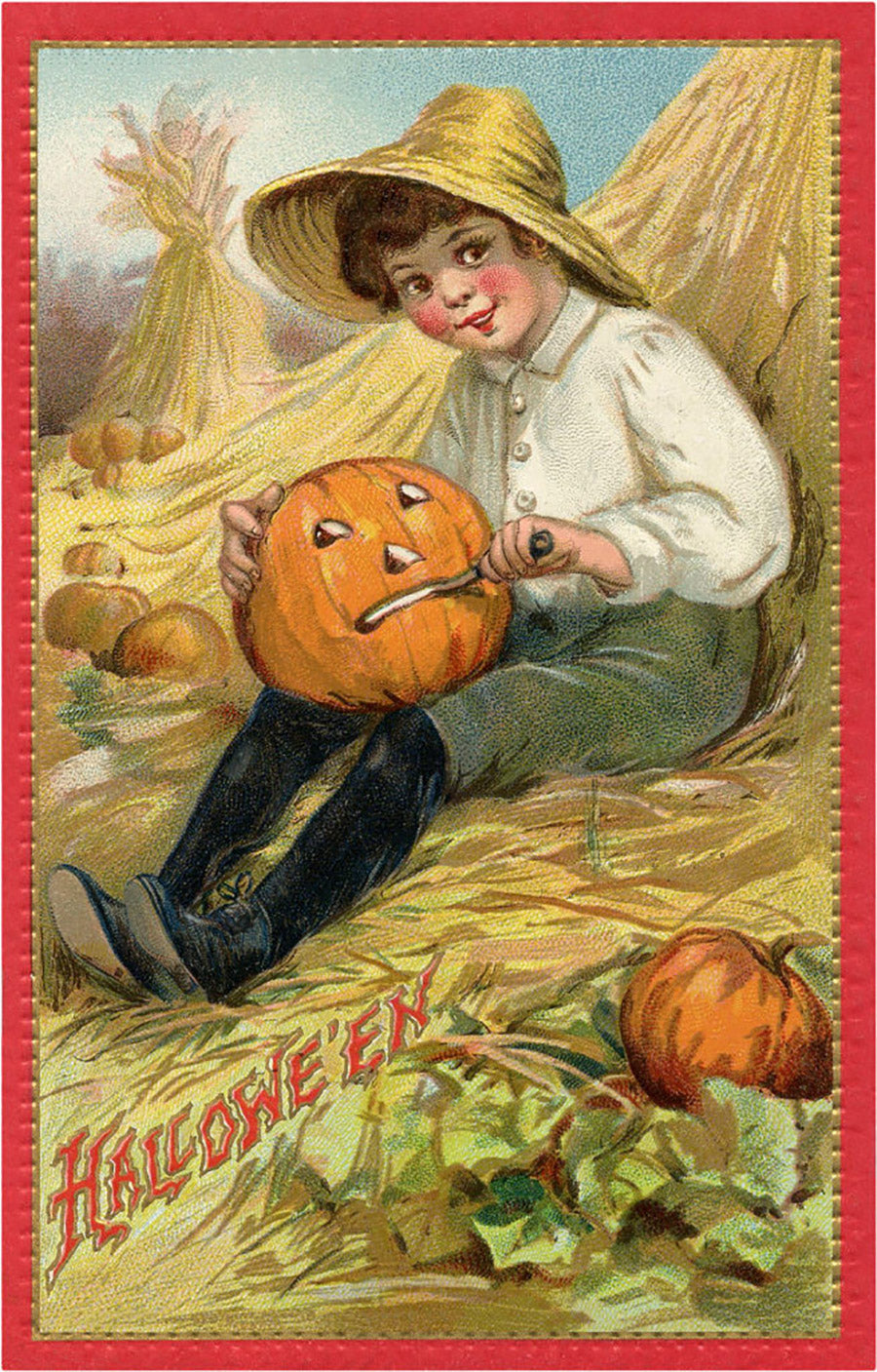 A boy carves a jack-o-lantern on an antique Halloween postcard