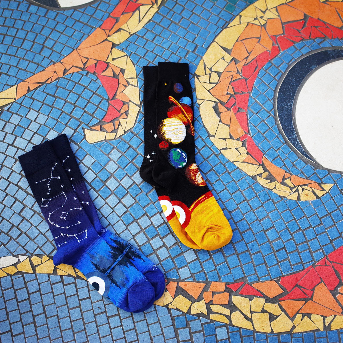 Space socks with stars and solar system planets.
