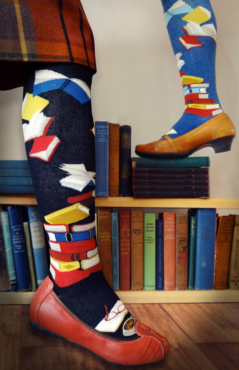 Book knee socks are pictures with stacks of books