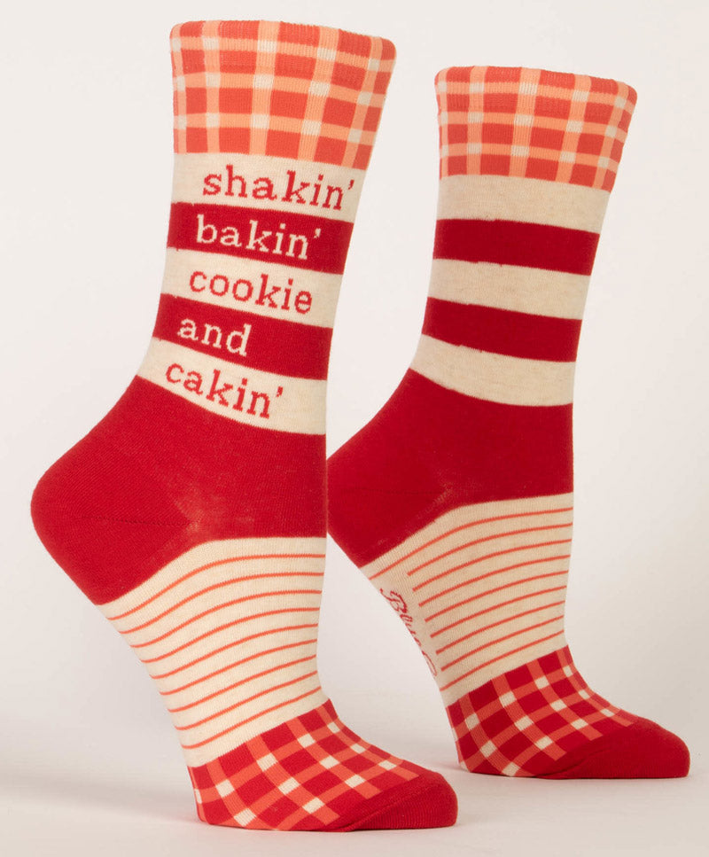 Red and white gingham baking socks that say "Shakin Bakin Cookie & Cakin'"
