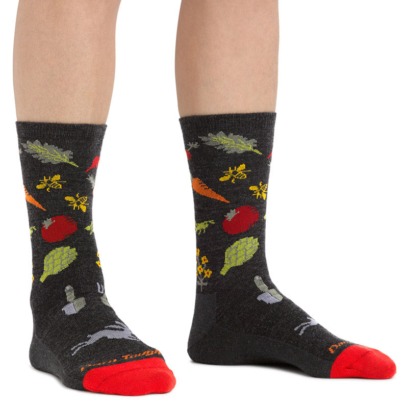 Vegetable socks with a melange of produce on socks made from merino wool