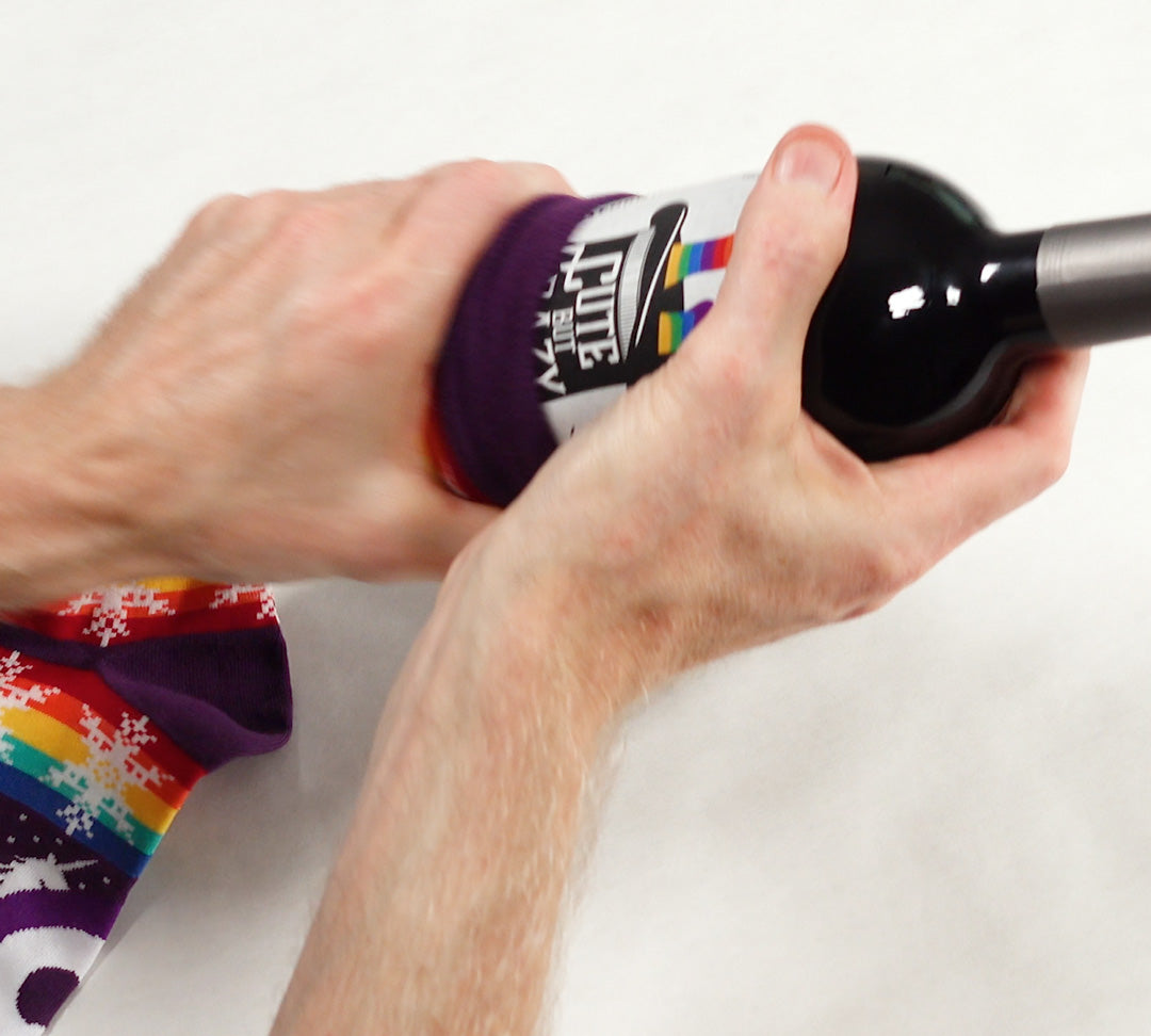 Wrap a wine bottle with socks! Step 6: Cover the bottle with the other sock.