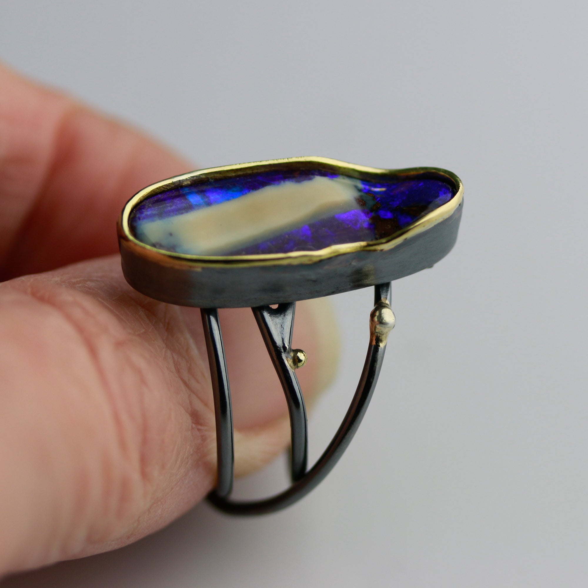 Sold! Vivid Violet Boulder Opal Ring with Swirled Band. Size 8 1/4.