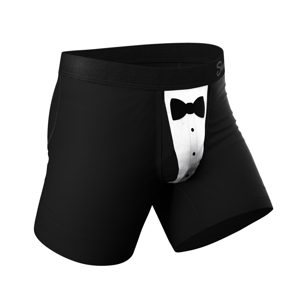 A close-up of stylish tuxedo boxers with bow tie detail.