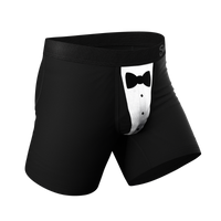 A close-up of stylish tuxedo boxers with bow tie detail.