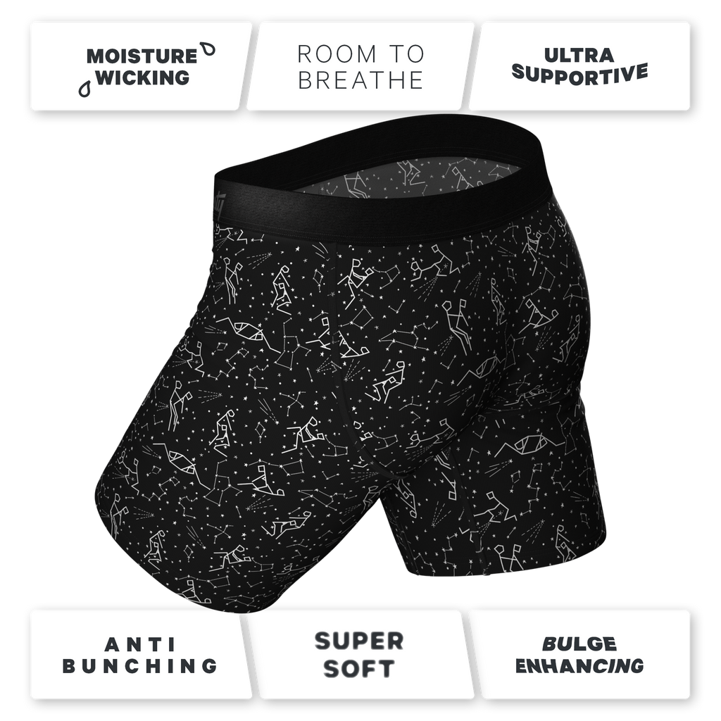 A pair of constellation pattern long leg Ball Hammock® underwear with a glow in the dark pouch.