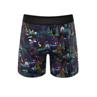 A pair of men's underwear with cartoon cryptid creatures.
