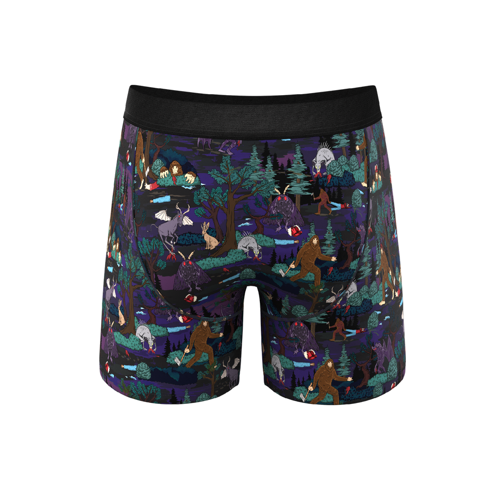 A pair of men's underwear with cartoon characters and animals.