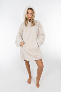 A woman in The Caribou Lous | Reversible Christmas Fur Hoodie, showcasing cozy comfort and style.