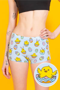 A woman in The Chicks Gone Wild boyshorts with cartoon chicks and eggs.