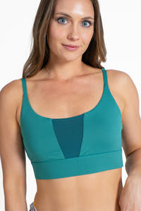 A woman in a cooling bralette, close-up of clothing details.