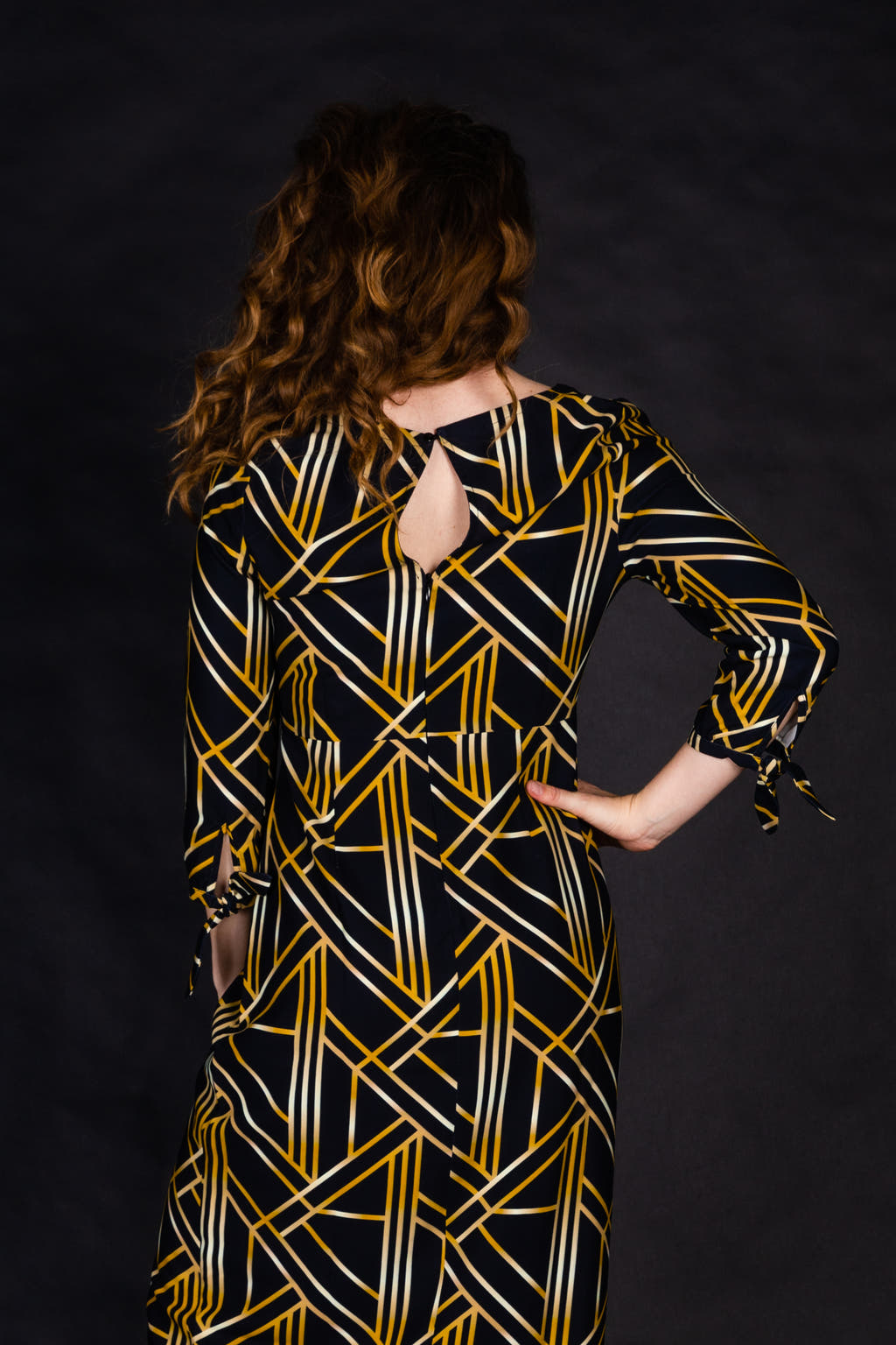 Women's gold and black midi dress