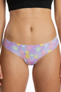 Close-up of The Juicy Fruit Pineapple Seamless Thong on a woman's body, emphasizing abdomen and undergarment details.
