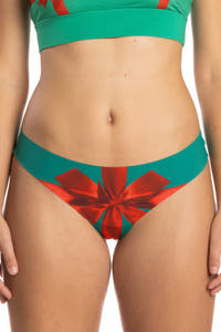 A woman wearing The Unwrap Me Christmas Present Seamless Thong.