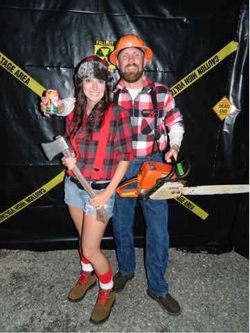 girl and guy dressed up like lumberjackers