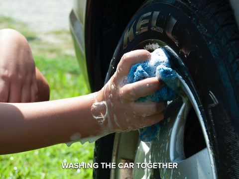 washing car together with dad