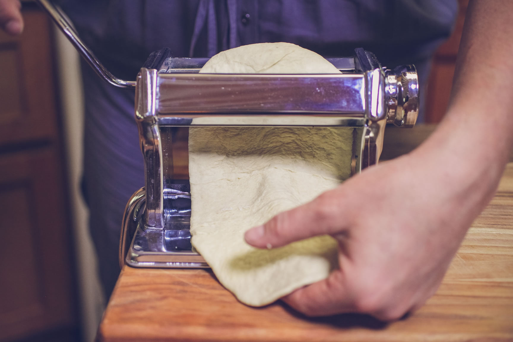 pass dough through pasta maker