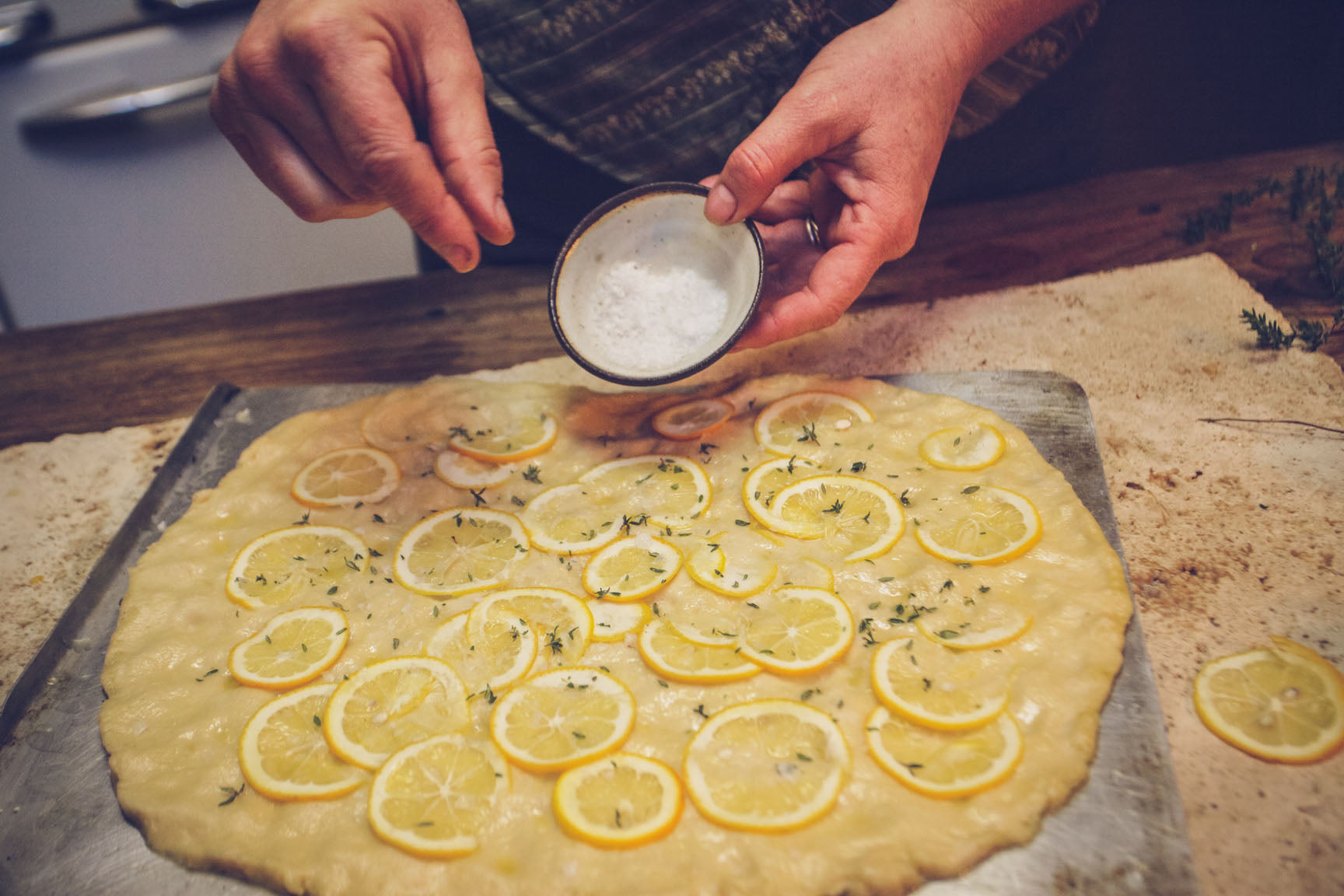 scatter salt and lemon slices