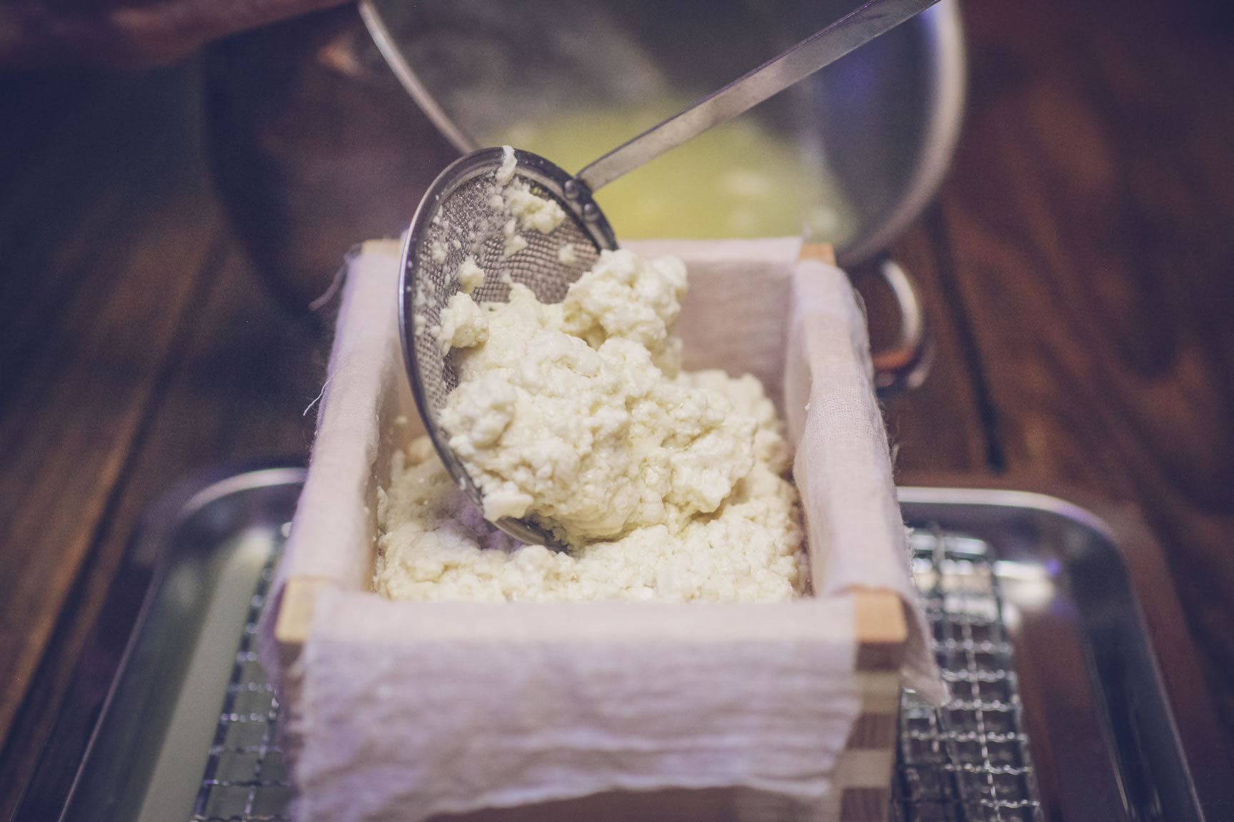 ladle curds into mold