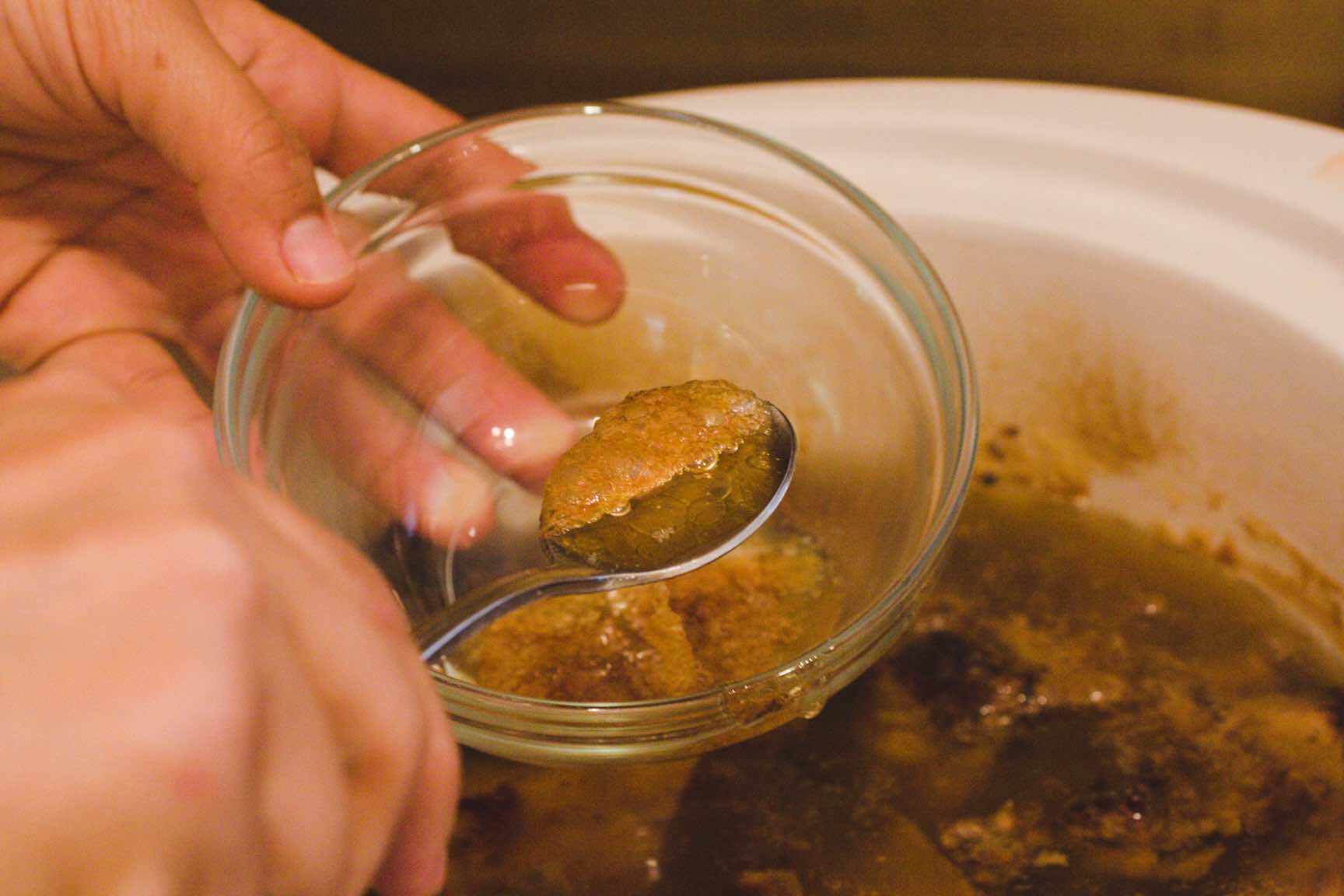 skimming the fat off of homemade bone broth