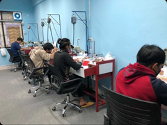 Manufacturing staff at work on LuvLoops jewellery.