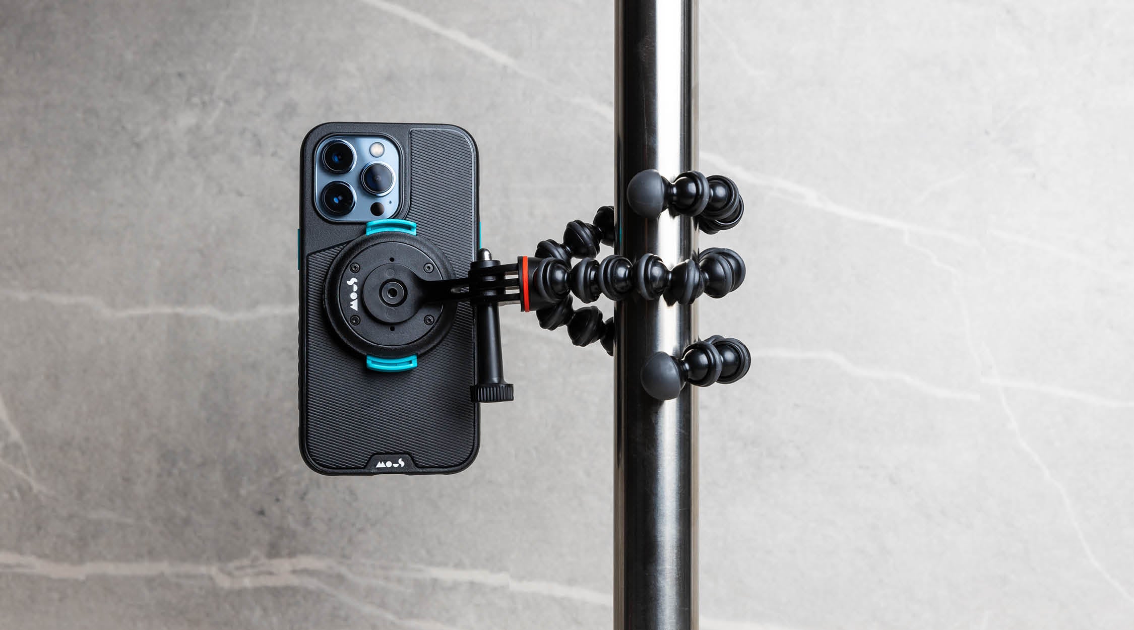 Mous IntraLock phone case mounted on a JOBY GorillaPod® 500 Action on a metal pole